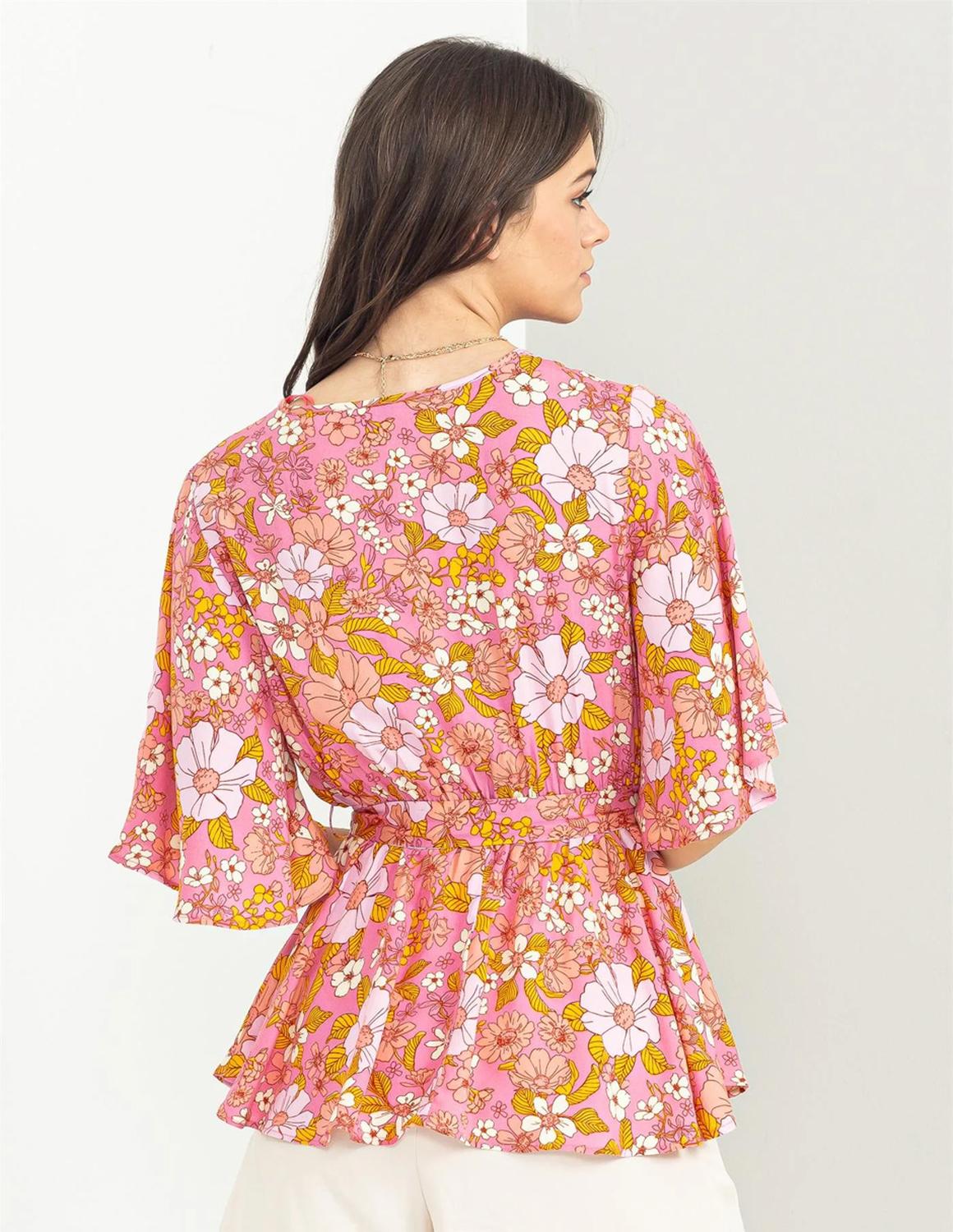 Blusa floral con cinto